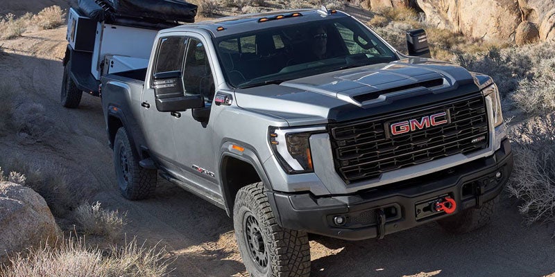 2026 GMC Sierra 2500 HD off-road in rocky terrain